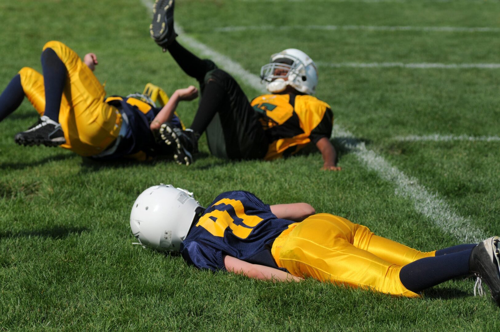 high-school-football-player-with-concussion